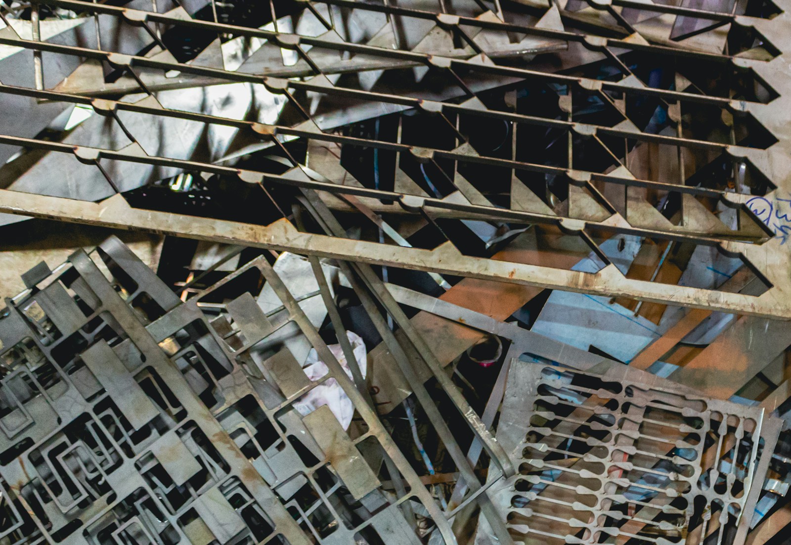 Scrap metal pieces with geometric patterns